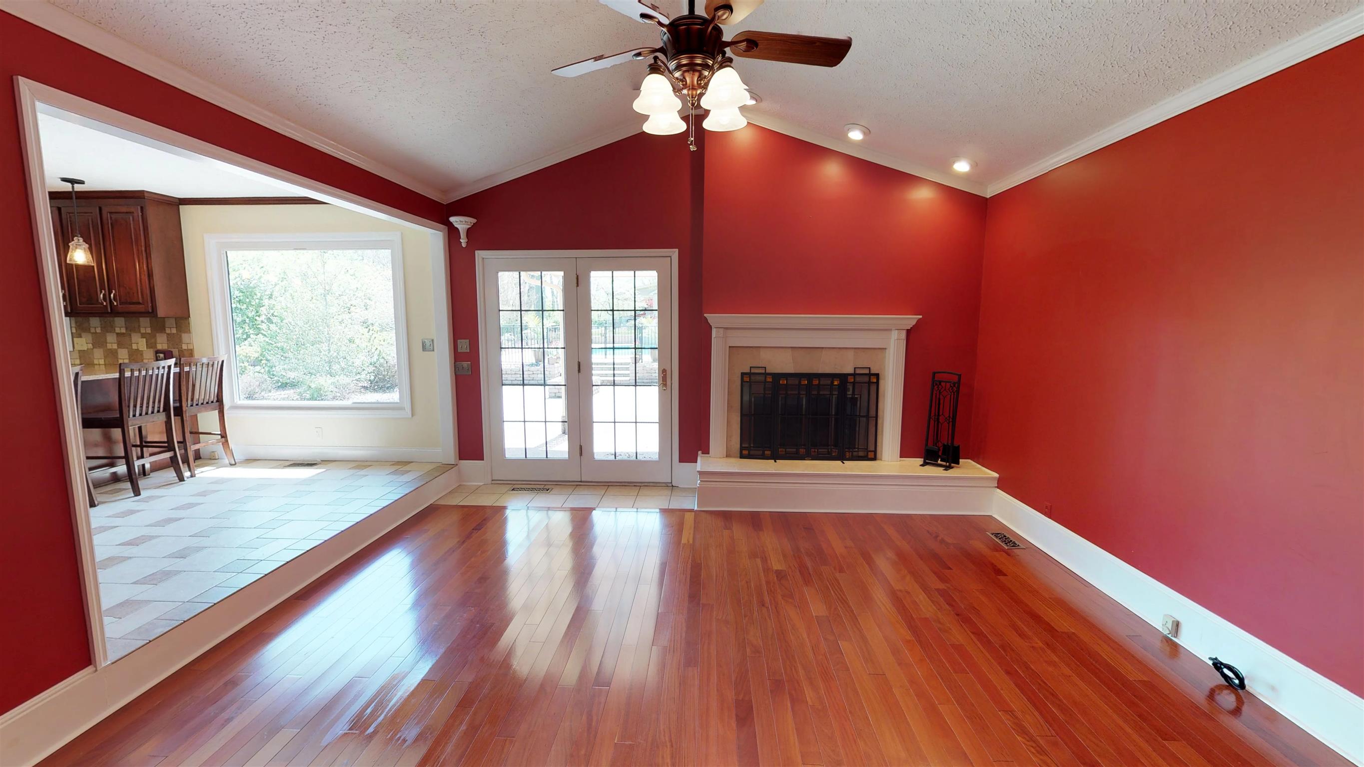 111 Spring Valley Road Nashville, TN 37214 - Photo 11 of 29 a view of an empty room with wooden floor and a window