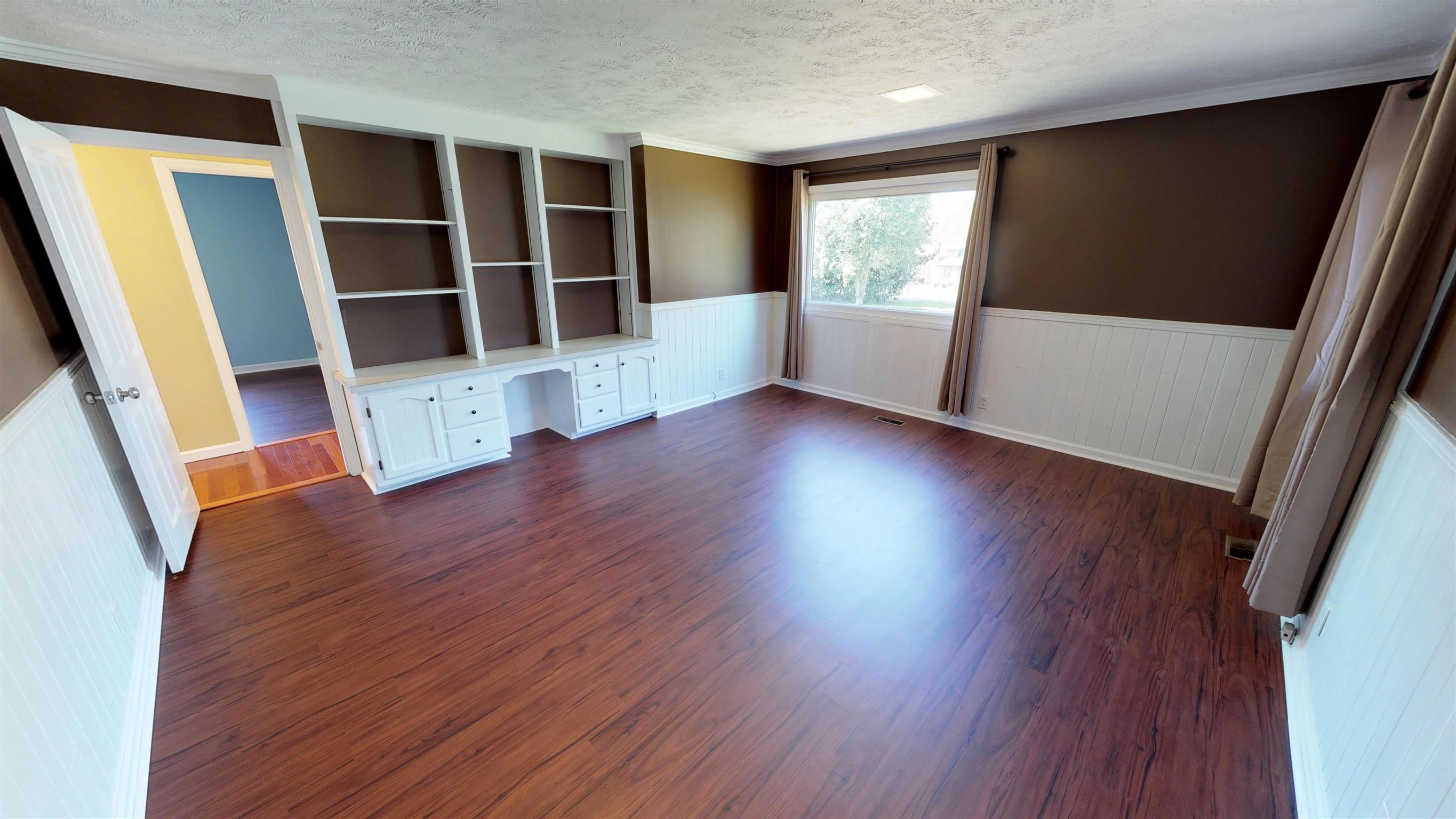 111 Spring Valley Road Nashville, TN 37214 - Photo 20 of 29 wooden floor in an empty room with a window