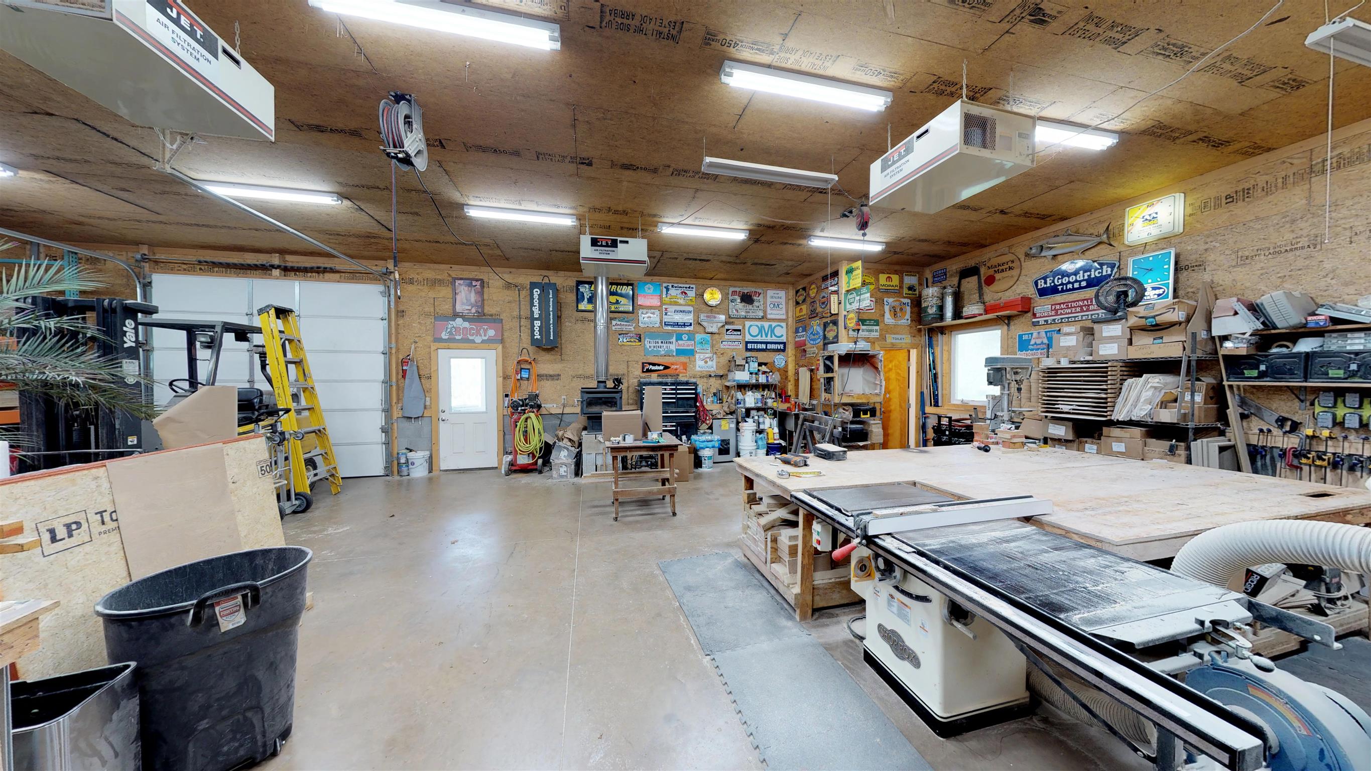 111 Spring Valley Road Nashville, TN 37214 - Photo 27 of 29 a large room with lots of furniture and clutter