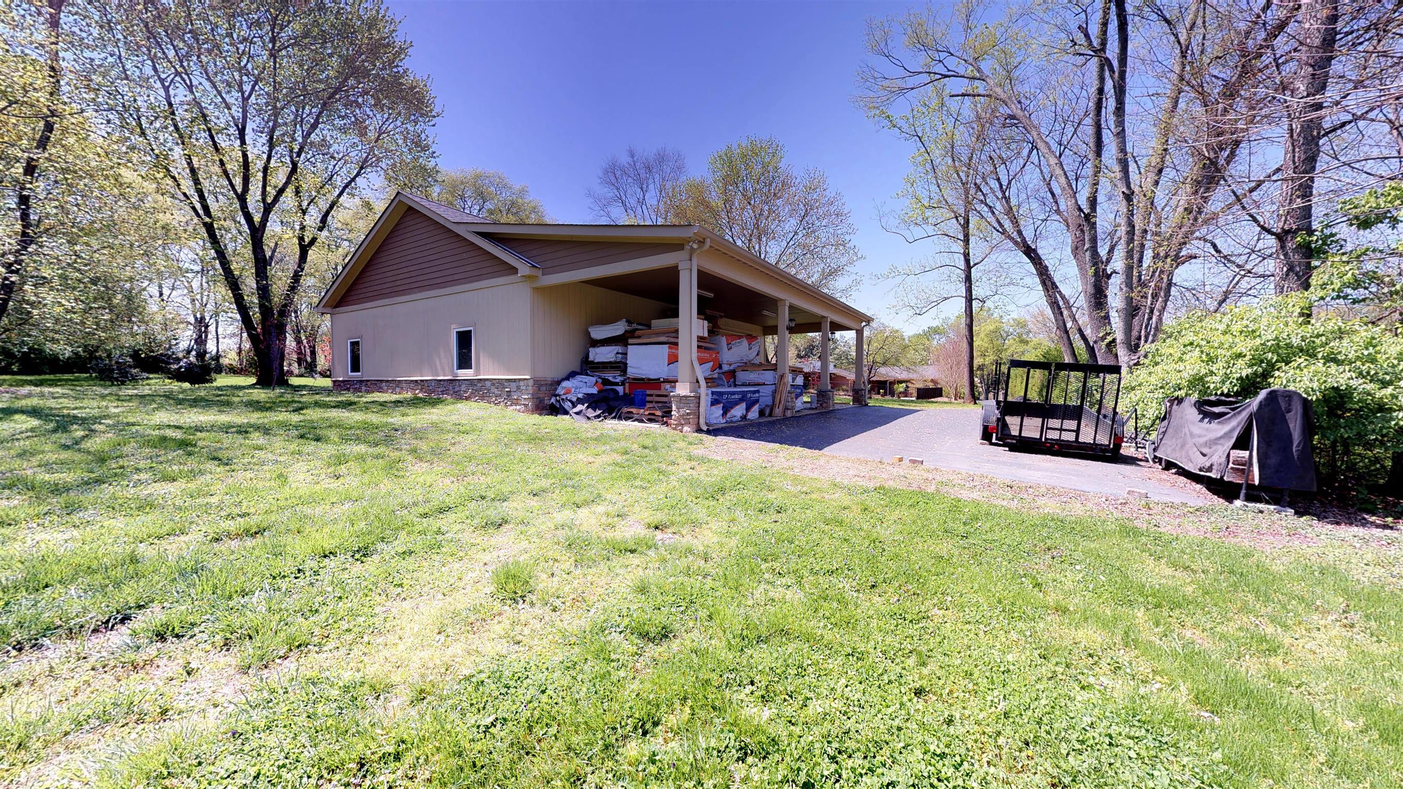 111 Spring Valley Road Nashville, TN 37214 - Photo 29 of 29 a view of a house with yard and sitting area