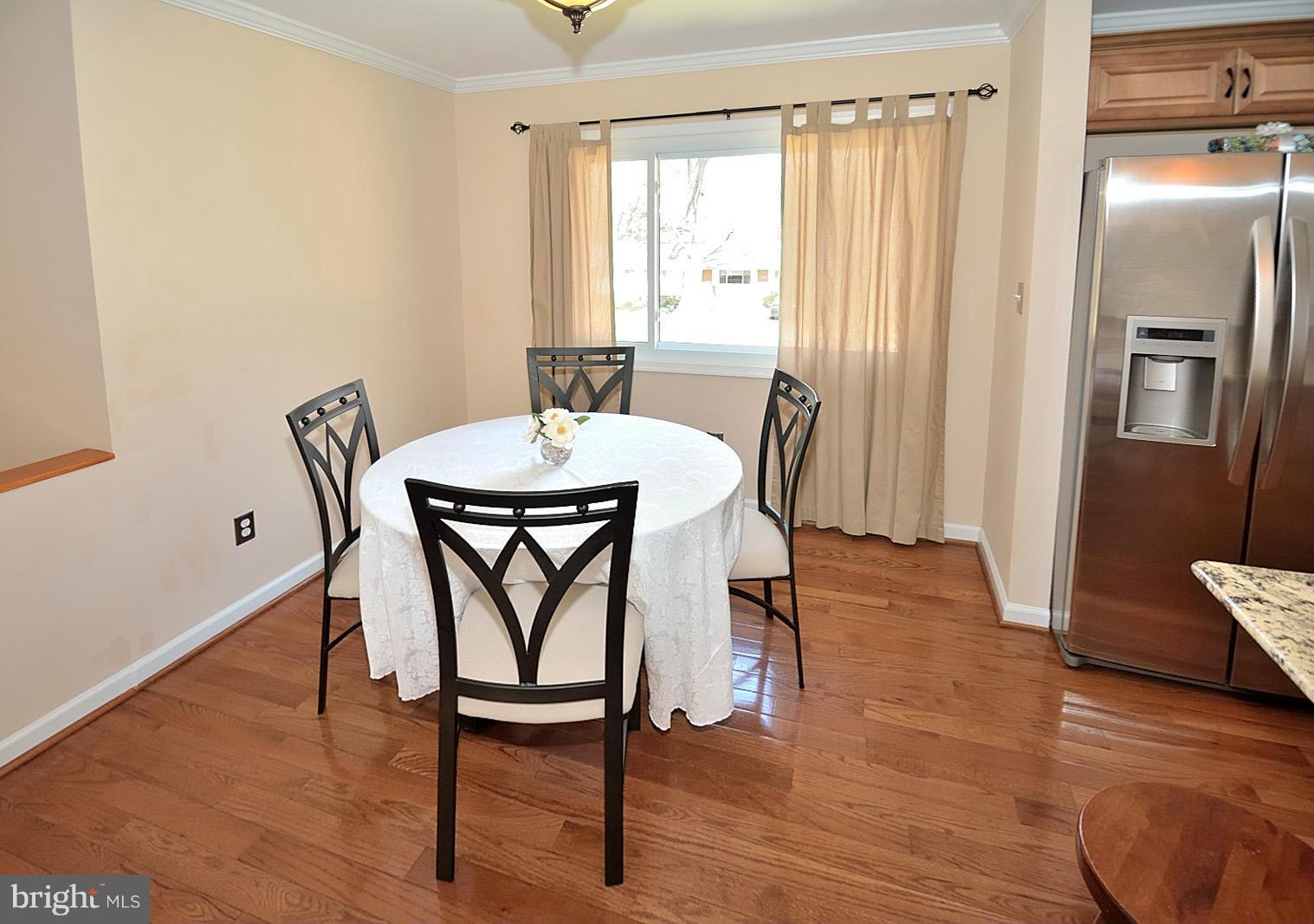 7529 Murillo Street Springfield, VA 22151 - Photo 4 of 30 Dining Area with warm hardwoods