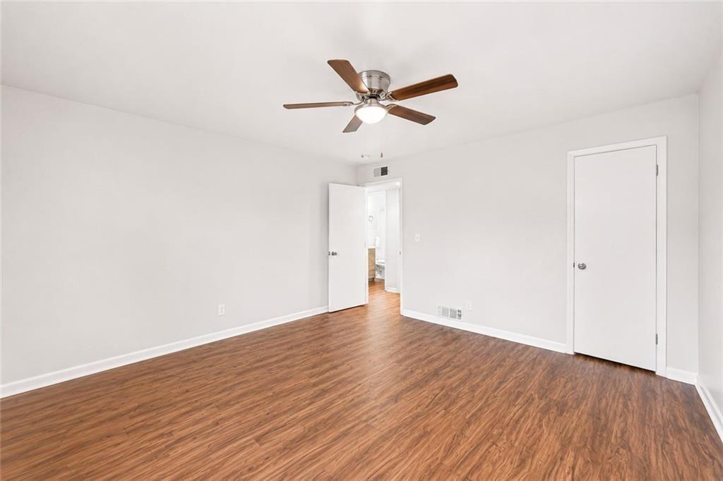 3203 East Point Street, Unit 4 Atlanta, GA 30344 - Photo 14 of 18 a view of empty room with wooden floor