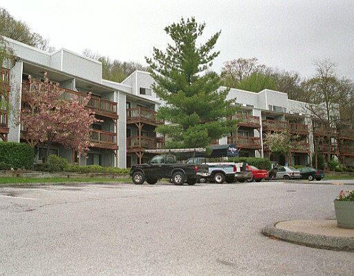 5 Nabby Road, Unit B89 Danbury, CT 06811 - Photo 1 of 1 a view of street with parked cars
