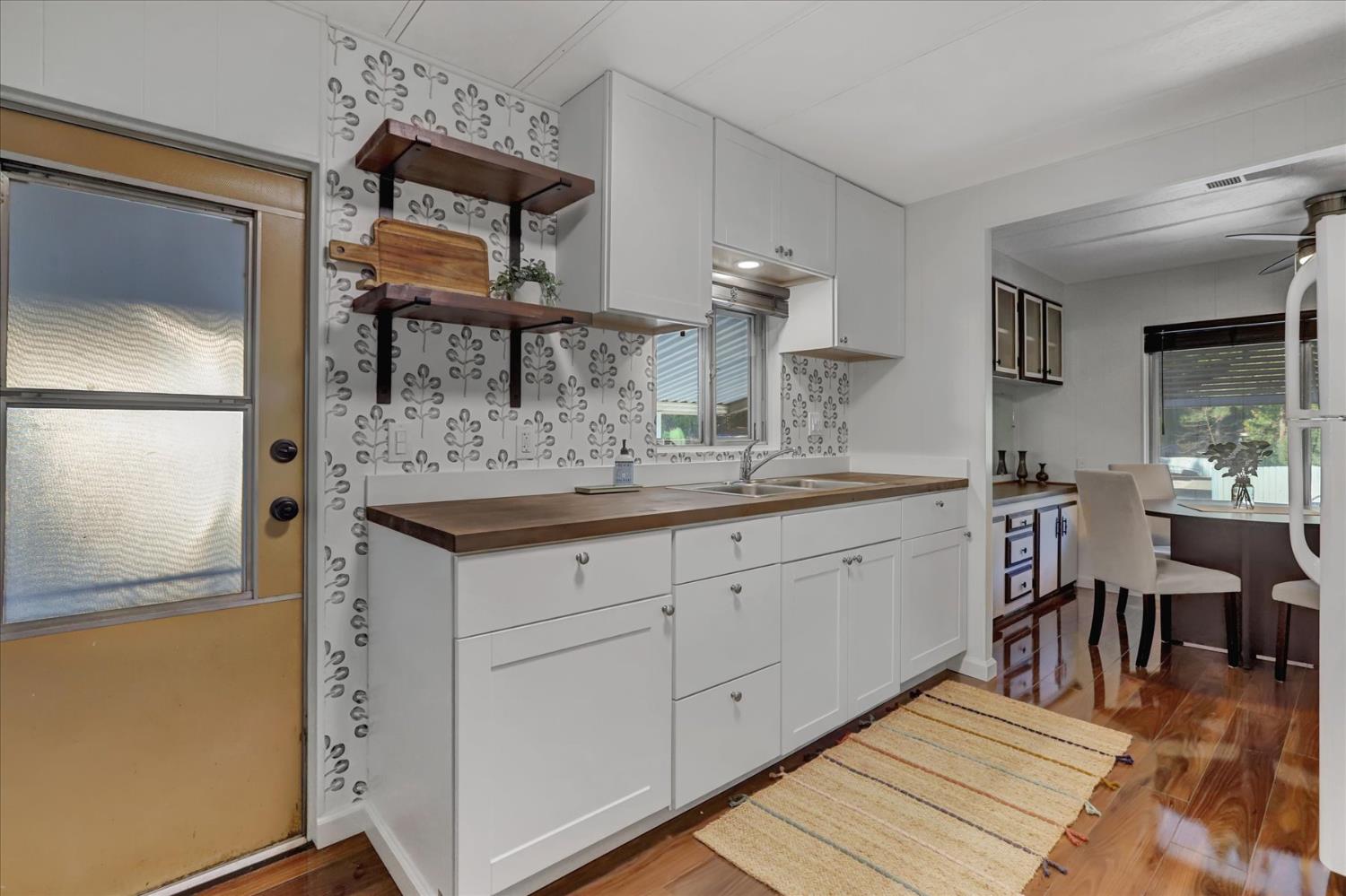 65 Primrose Lane Grass Valley, CA 95945 - Photo 12 of 41 a spacious bathroom with a double vanity sink and a mirror