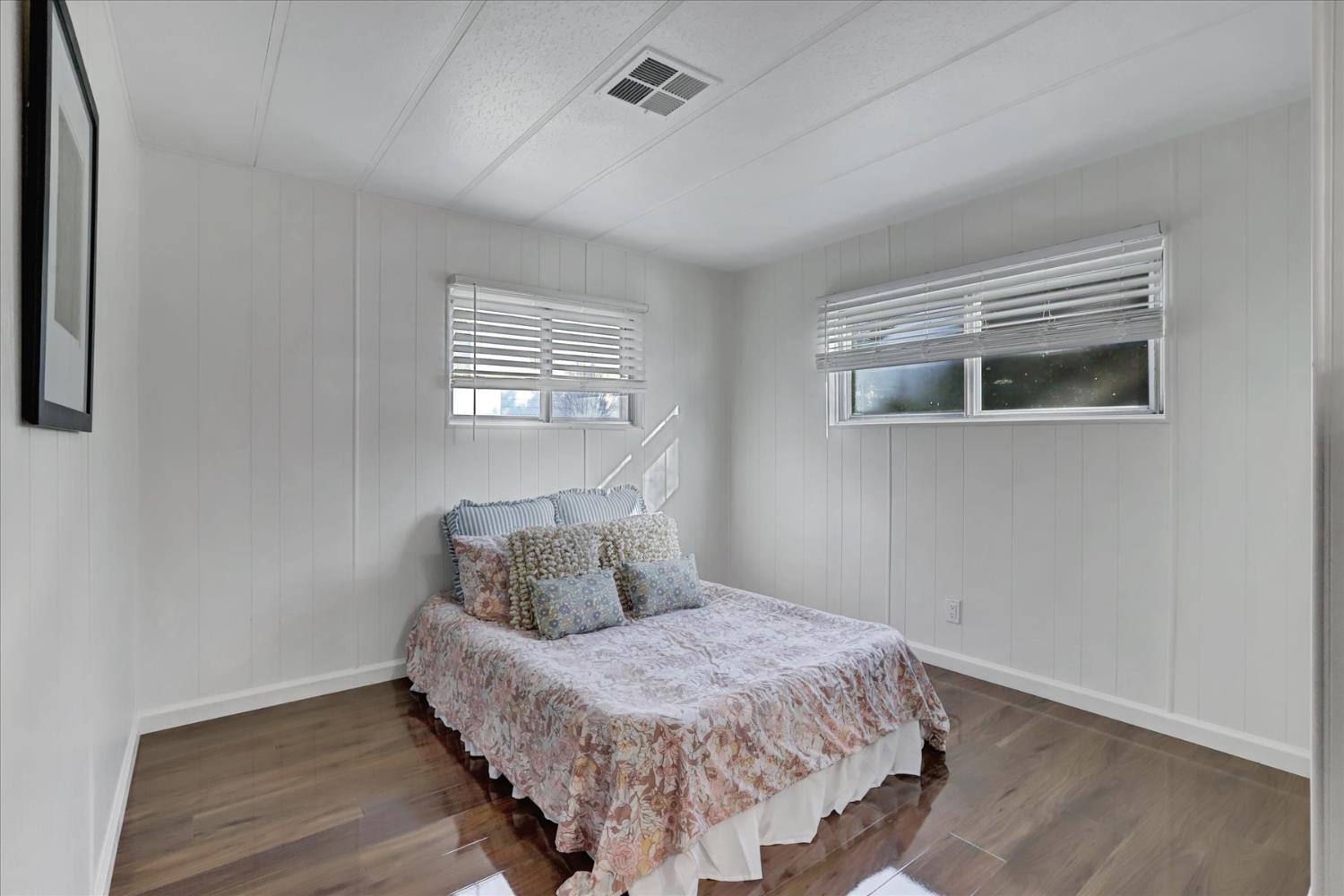 65 Primrose Lane Grass Valley, CA 95945 - Photo 20 of 41 a bedroom with a bed and a window