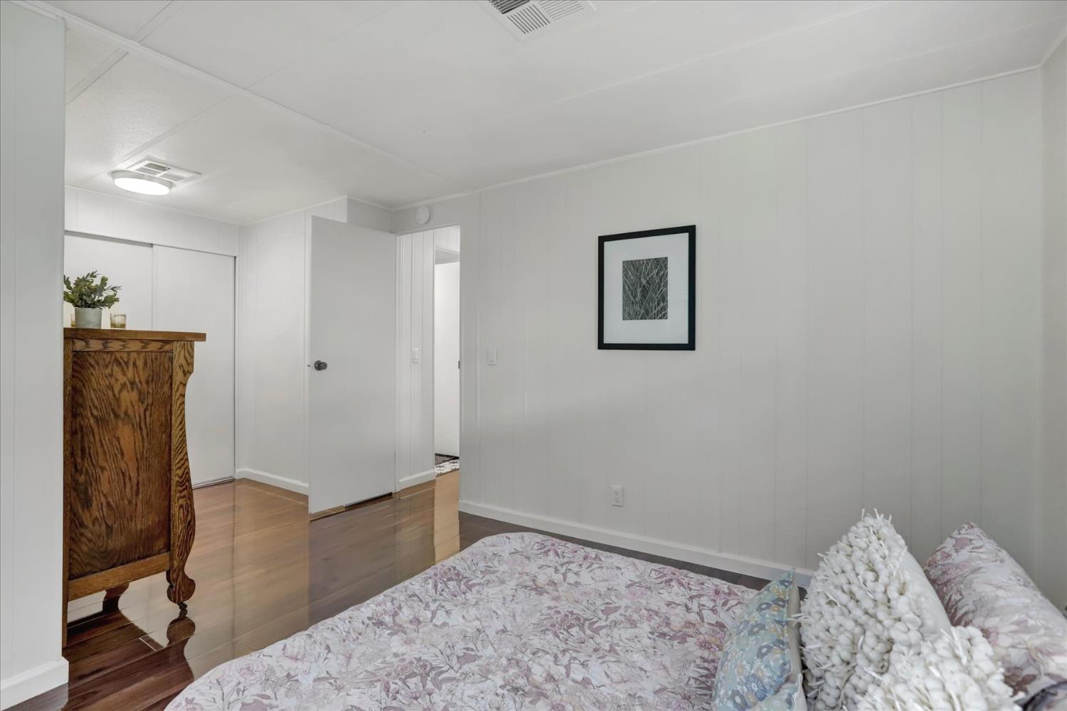 65 Primrose Lane Grass Valley, CA 95945 - Photo 22 of 41 a bedroom with a bed and furniture