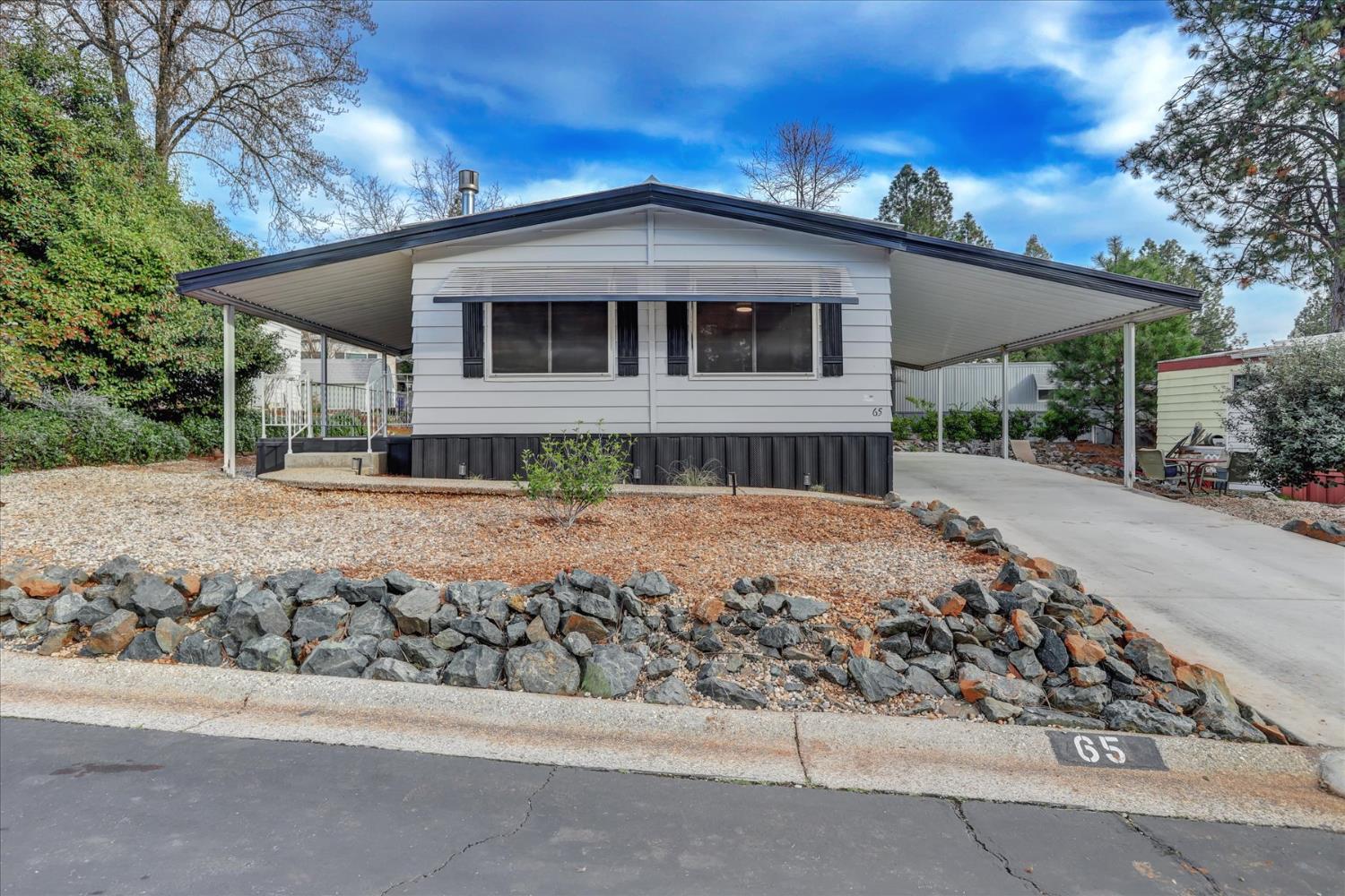 65 Primrose Lane Grass Valley, CA 95945 - Photo 28 of 41 front view of a house with a outdoor space