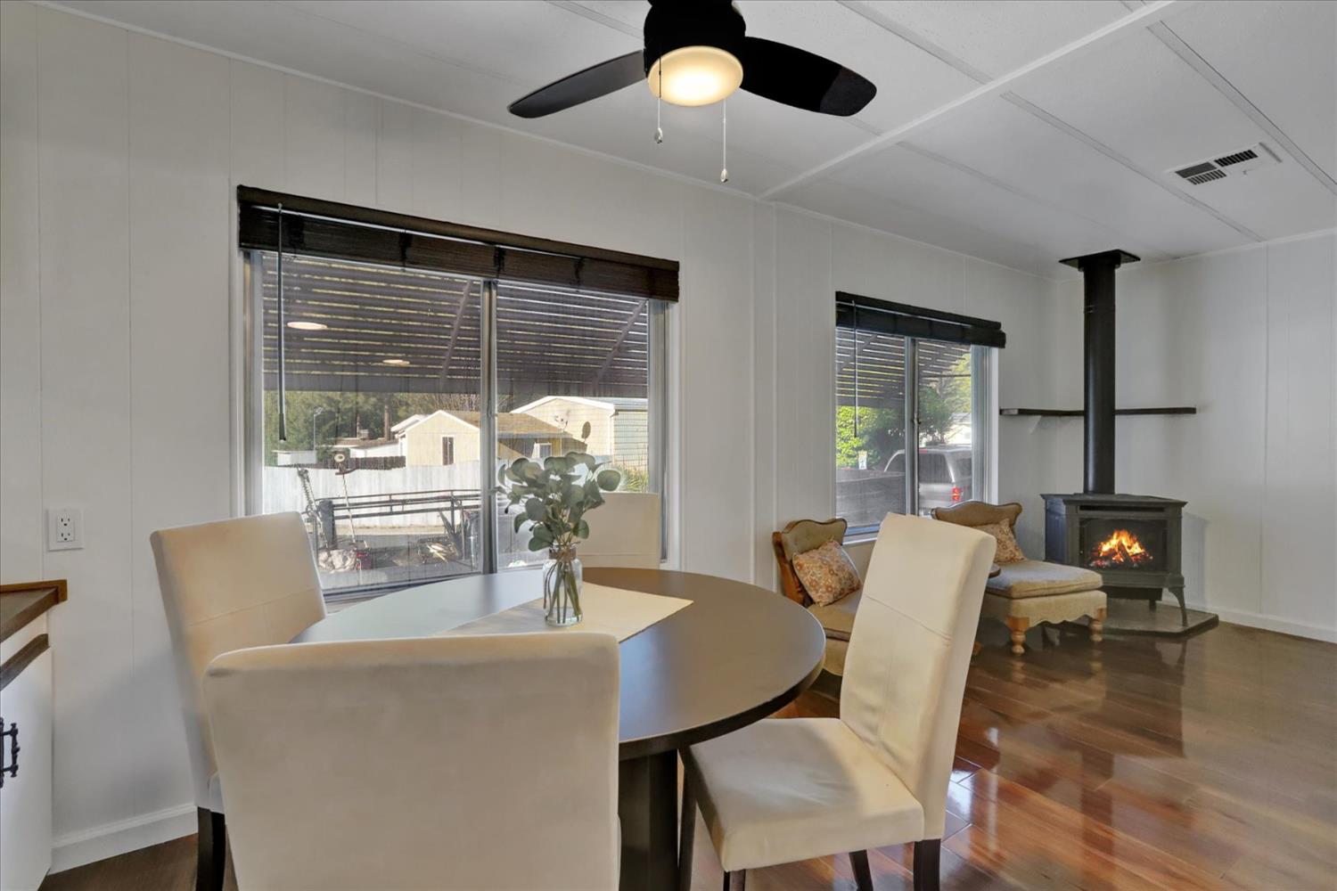 65 Primrose Lane Grass Valley, CA 95945 - Photo 9 of 41 a dining room with furniture window and wooden floor