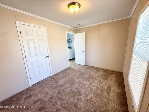 a view of livingroom with hardwood floor and window