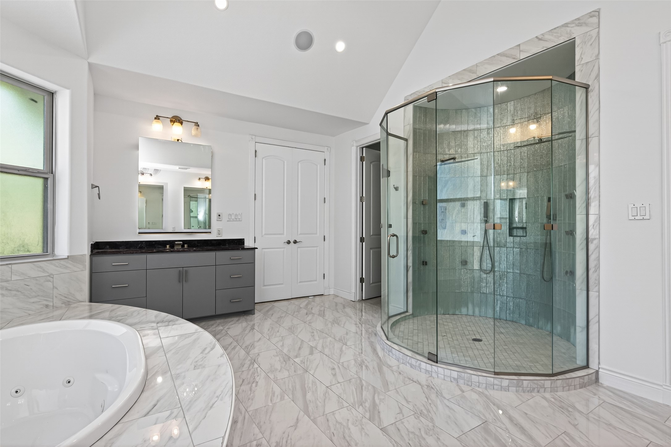 2504 Southline Road Conroe, TX 77384 - Photo 15 of 26 a bathroom with a sink a toilet and shower