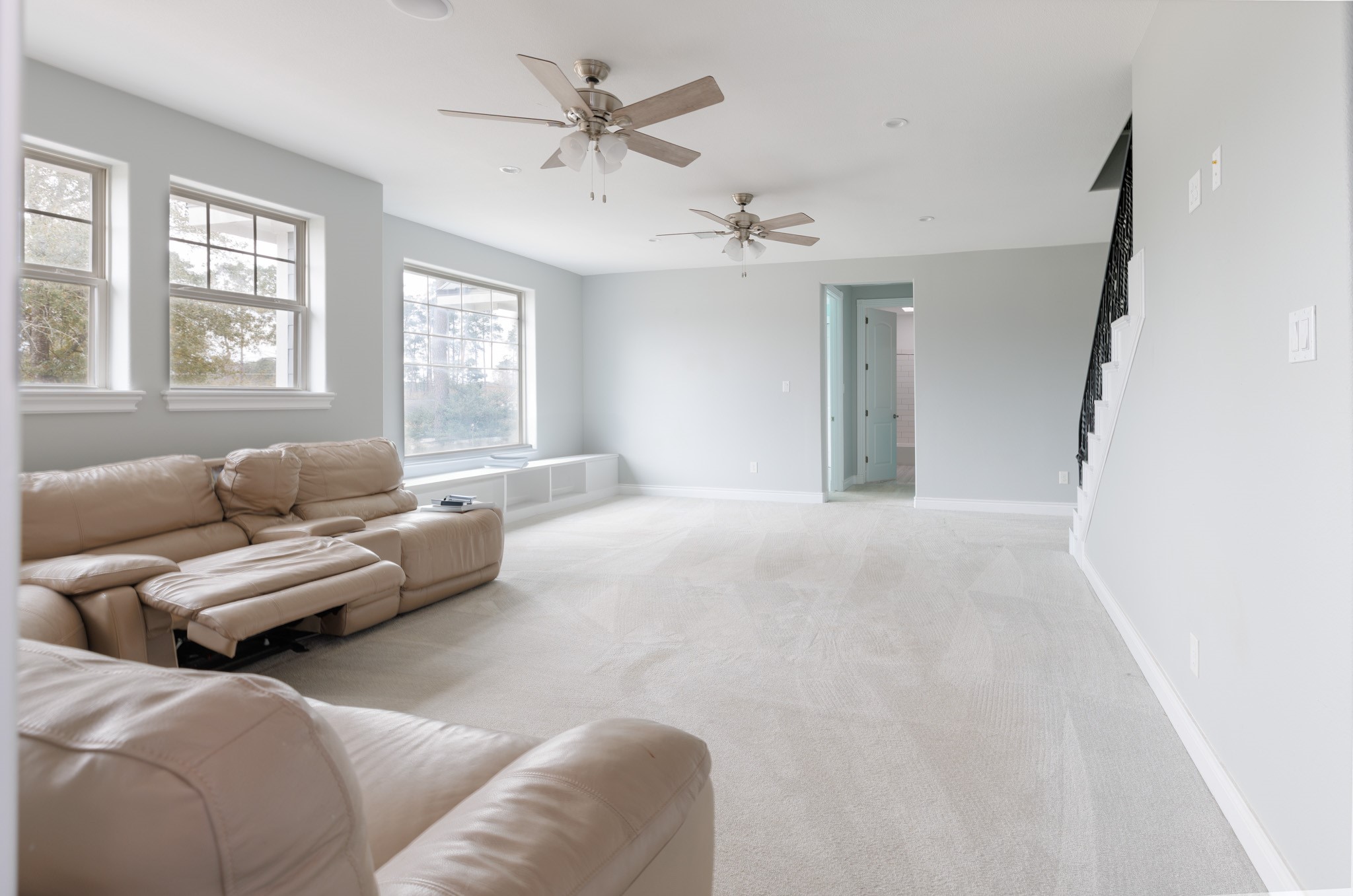 2504 Southline Road Conroe, TX 77384 - Photo 16 of 20 a living room with furniture and windows