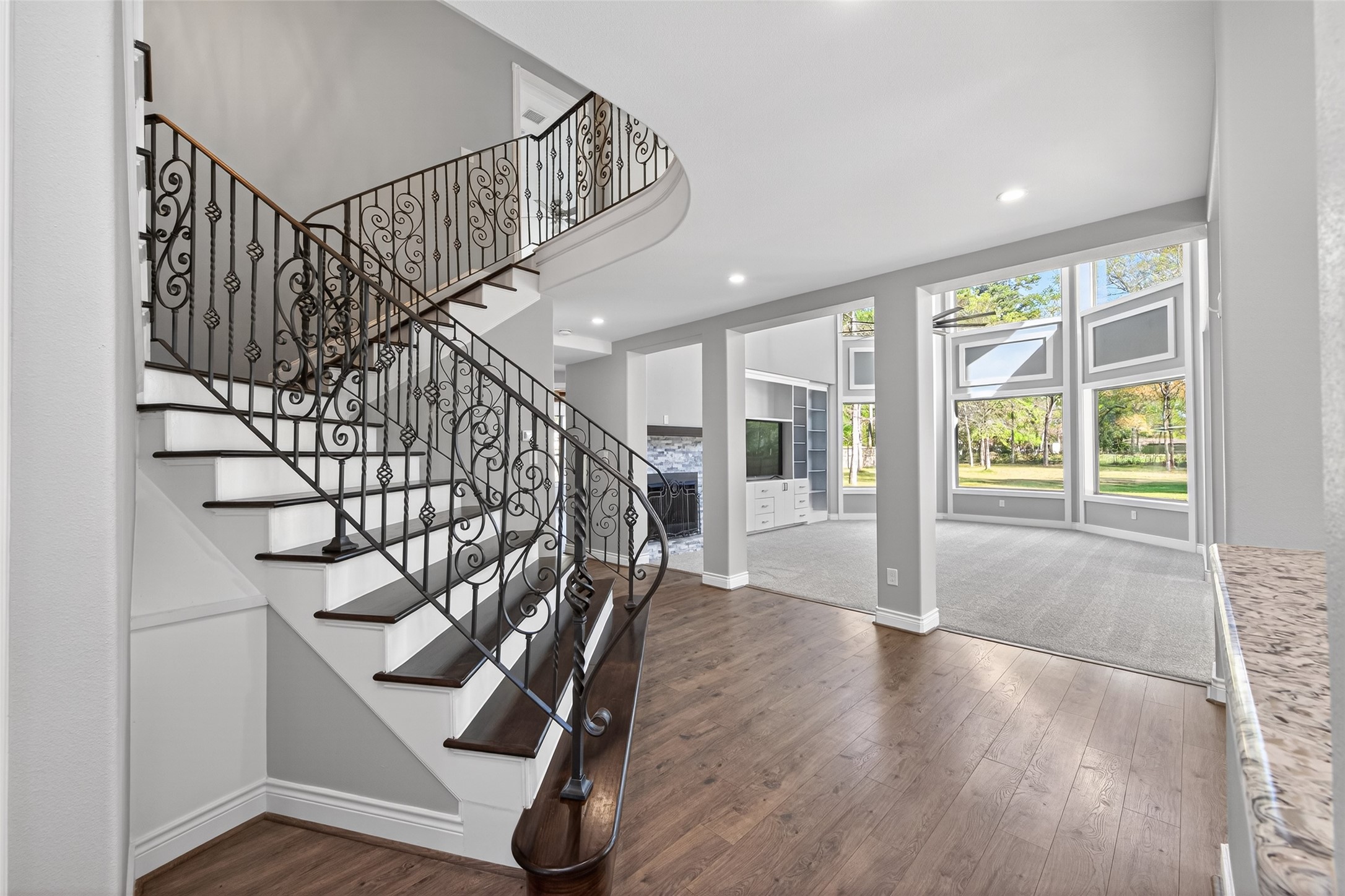2504 Southline Road Conroe, TX 77384 - Photo 4 of 26 a view of entryway with wooden floor and stairs