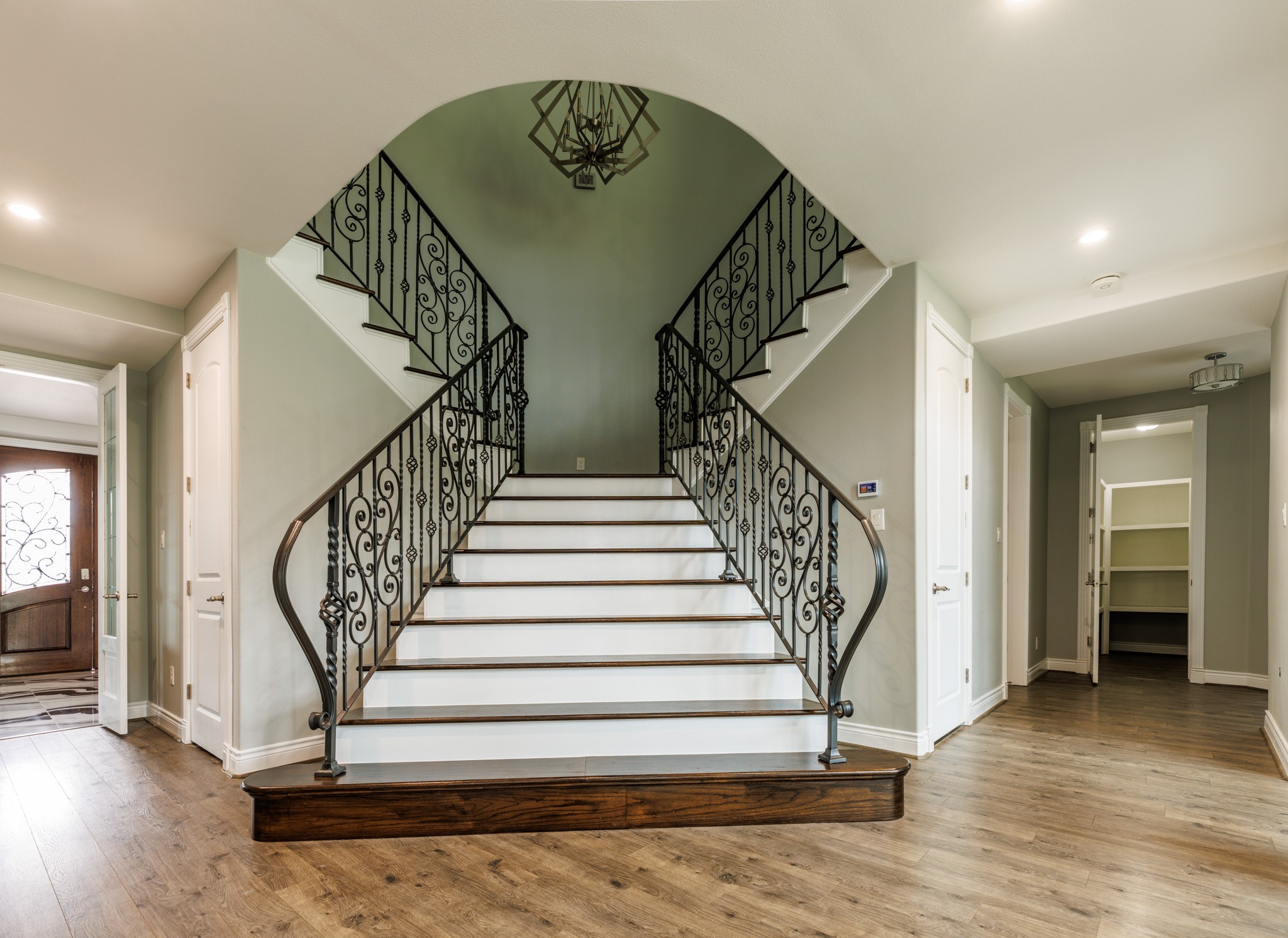 2504 Southline Road Conroe, TX 77384 - Photo 4 of 20 a view of entryway livingroom and hall with wooden floor