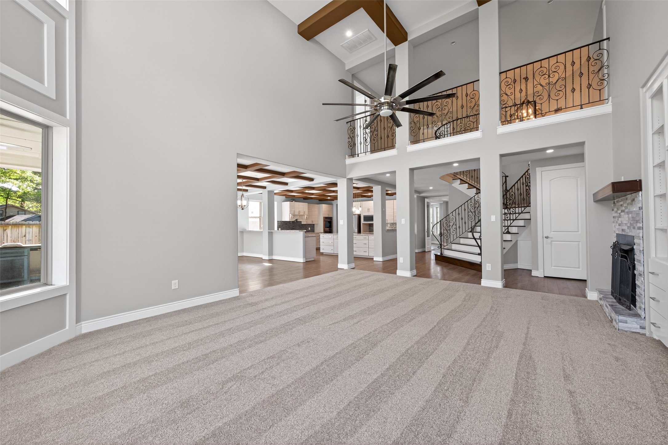 2504 Southline Road Conroe, TX 77384 - Photo 8 of 26 a view of a livingroom with wooden floor and a ceiling fan
