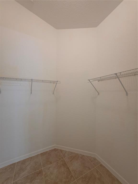 4532 Great Blue Heron Drive Lakeland, FL 33812 - Photo 21 of 33 a view of a room with racks on the wall