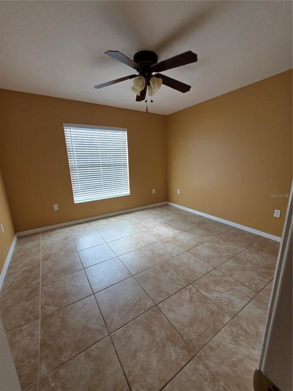 4532 Great Blue Heron Drive Lakeland, FL 33812 - Photo 28 of 33 a view of an empty room with a window