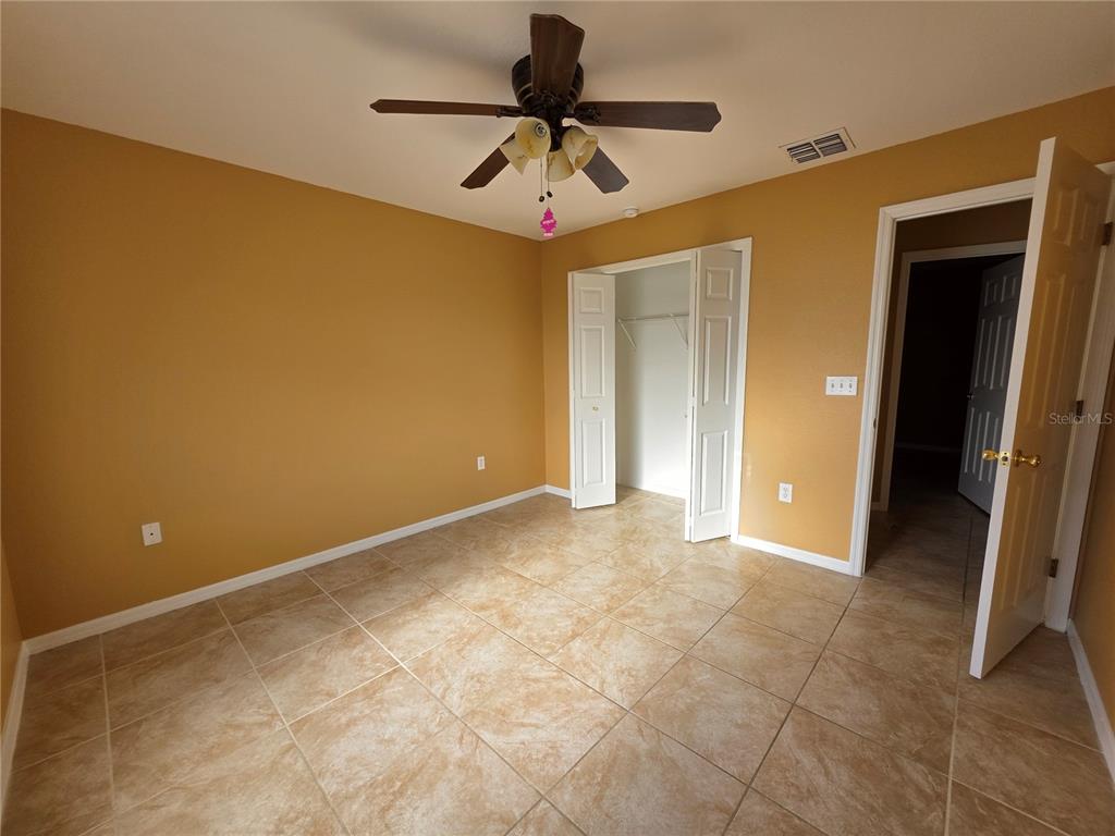 4532 Great Blue Heron Drive Lakeland, FL 33812 - Photo 29 of 33 a very nice looking room with a ceiling fan