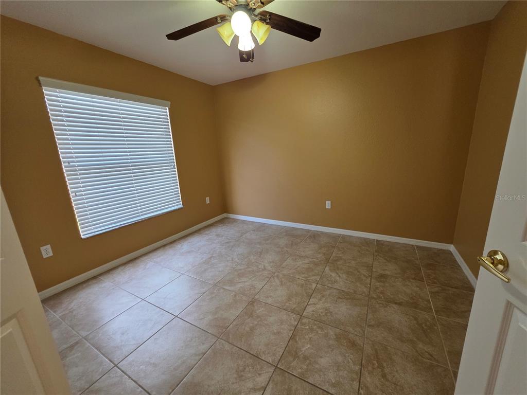 4532 Great Blue Heron Drive Lakeland, FL 33812 - Photo 31 of 33 a view of an empty room with a window