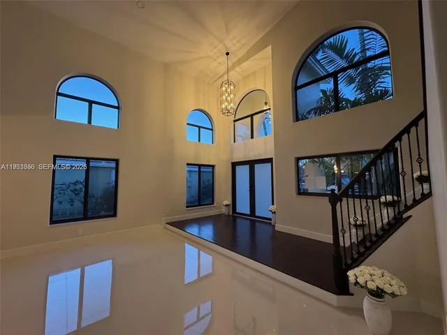 a bathroom with a double vanity sink and mirror