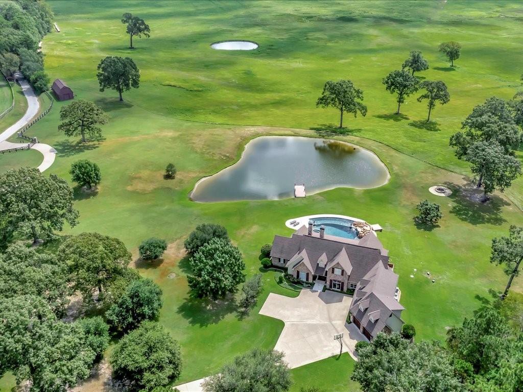 1811 Caspers Cv Road Lufkin, TX 75904 - Photo 2 of 40 an aerial view of a house with a yard