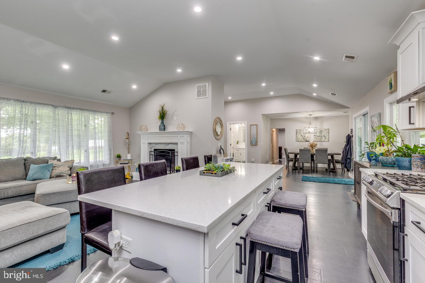 332 Juliustown Road Columbus, NJ 08022 - Photo 12 of 65 a view of a dining room with furniture and a fireplace
