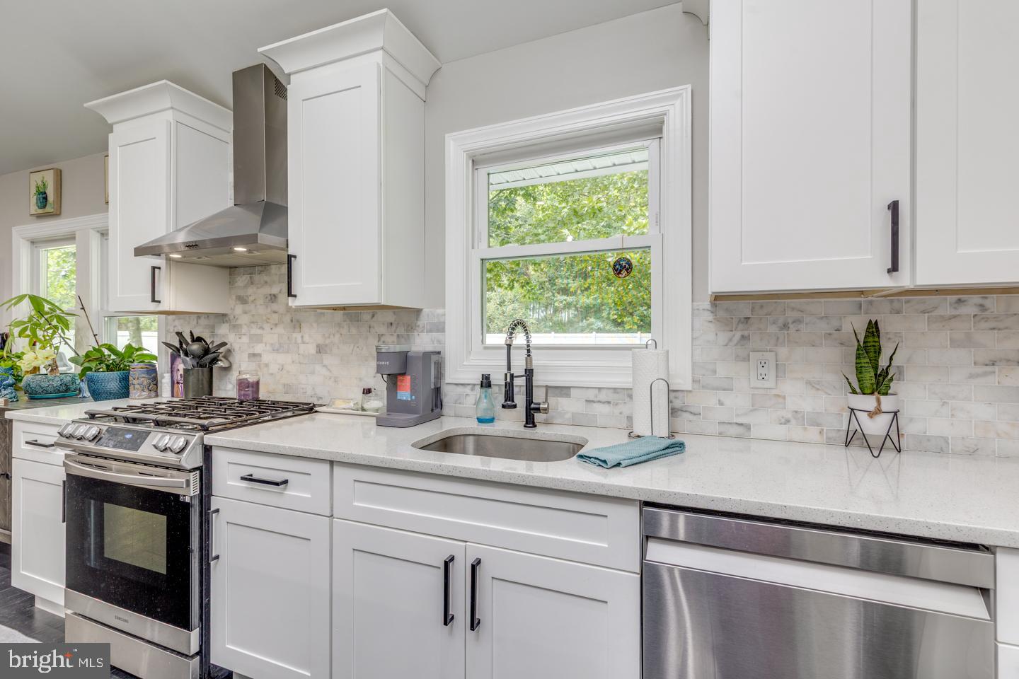 332 Juliustown Road Columbus, NJ 08022 - Photo 16 of 65 a kitchen with stainless steel appliances white cabinets and a stove top oven