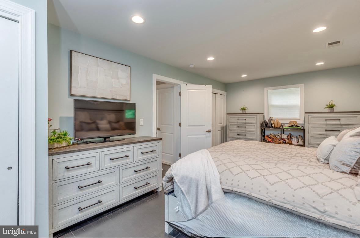 332 Juliustown Road Columbus, NJ 08022 - Photo 23 of 65 a bedroom with a bed and a flat screen tv