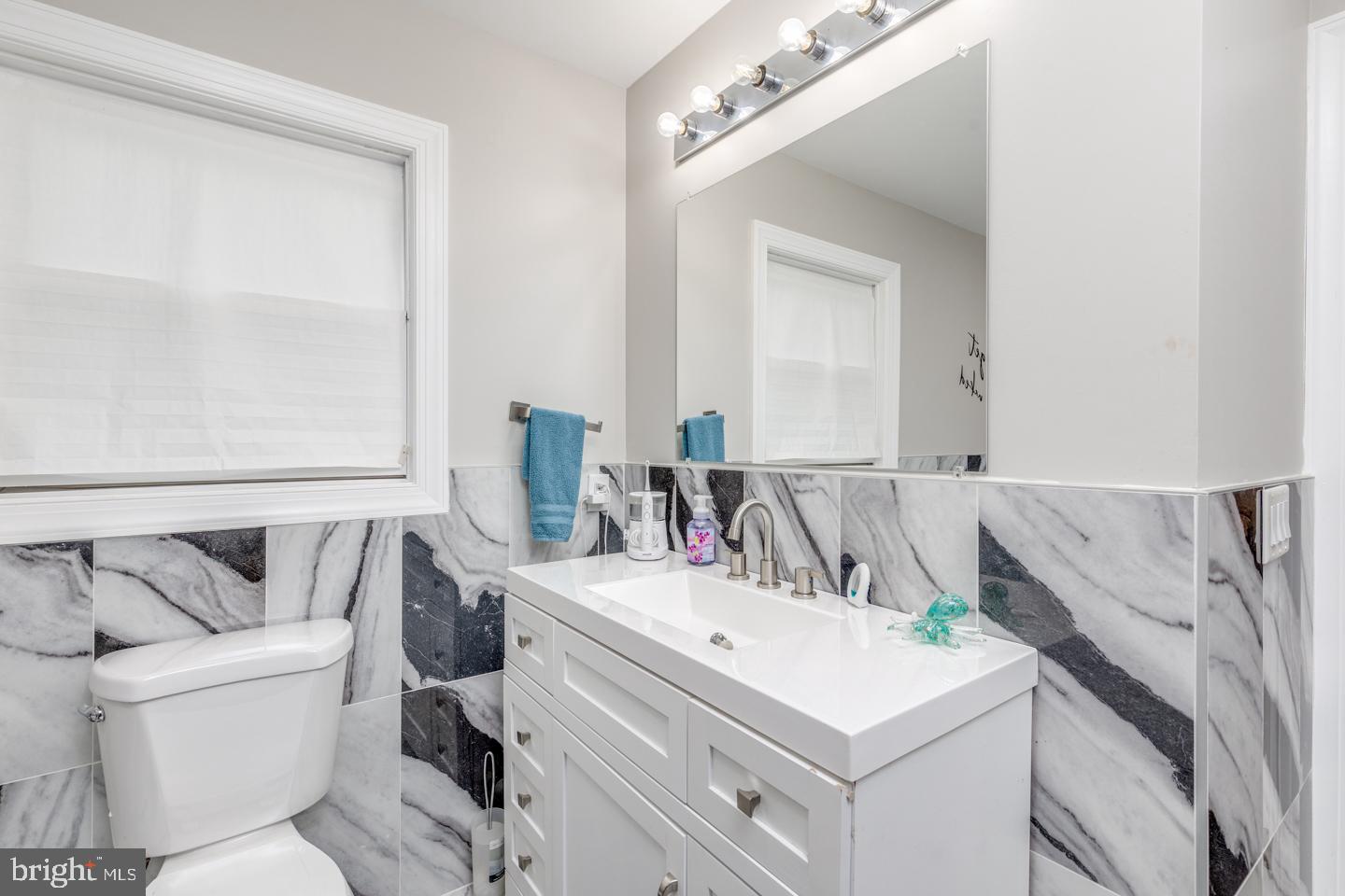 332 Juliustown Road Columbus, NJ 08022 - Photo 27 of 65 a bathroom with a sink and a mirror