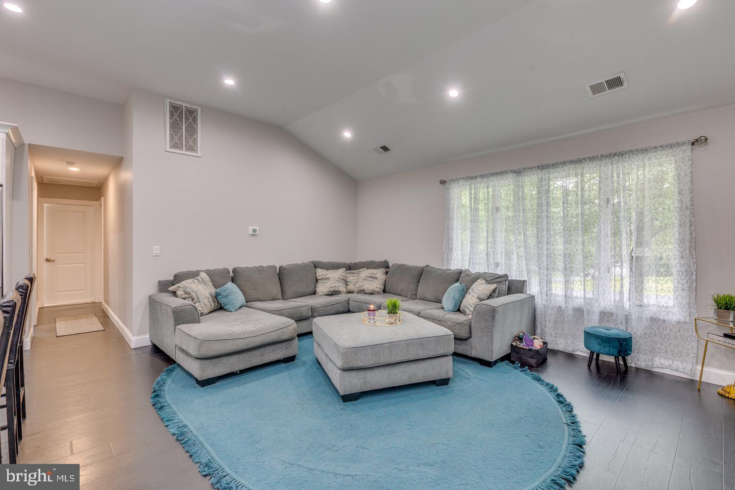 332 Juliustown Road Columbus, NJ 08022 - Photo 10 of 65 a living room with furniture and a large window