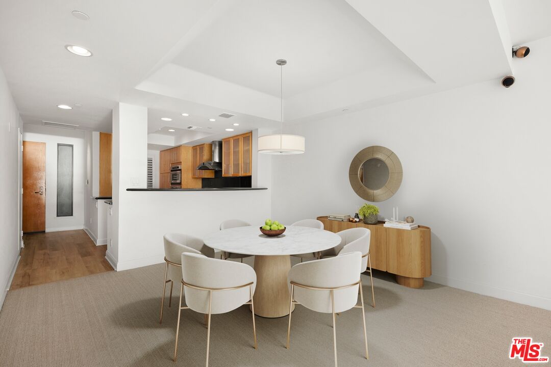 130 Ocean Park Boulevard, Unit 431 Santa Monica, CA 90405 - Photo 6 of 17 a dining room with furniture and window