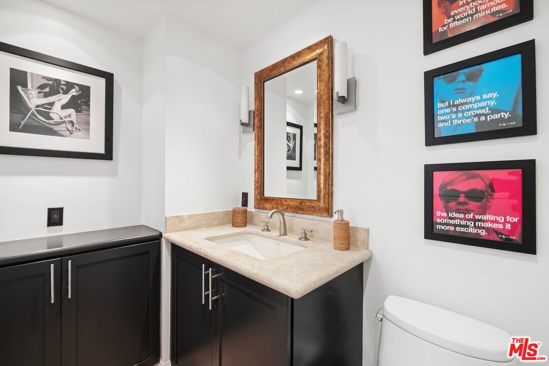 130 Ocean Park Boulevard, Unit 431 Santa Monica, CA 90405 - Photo 10 of 17 a bathroom with a sink and a mirror
