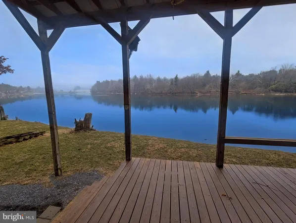 a view of a lake from a balcony