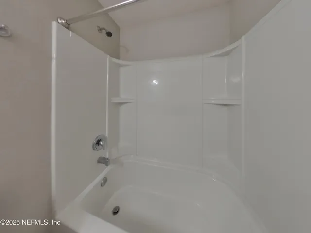 a bathroom with a bathtub