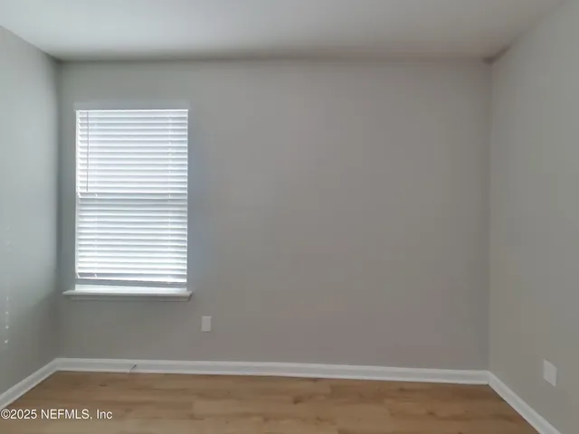 a view of a small space with a window