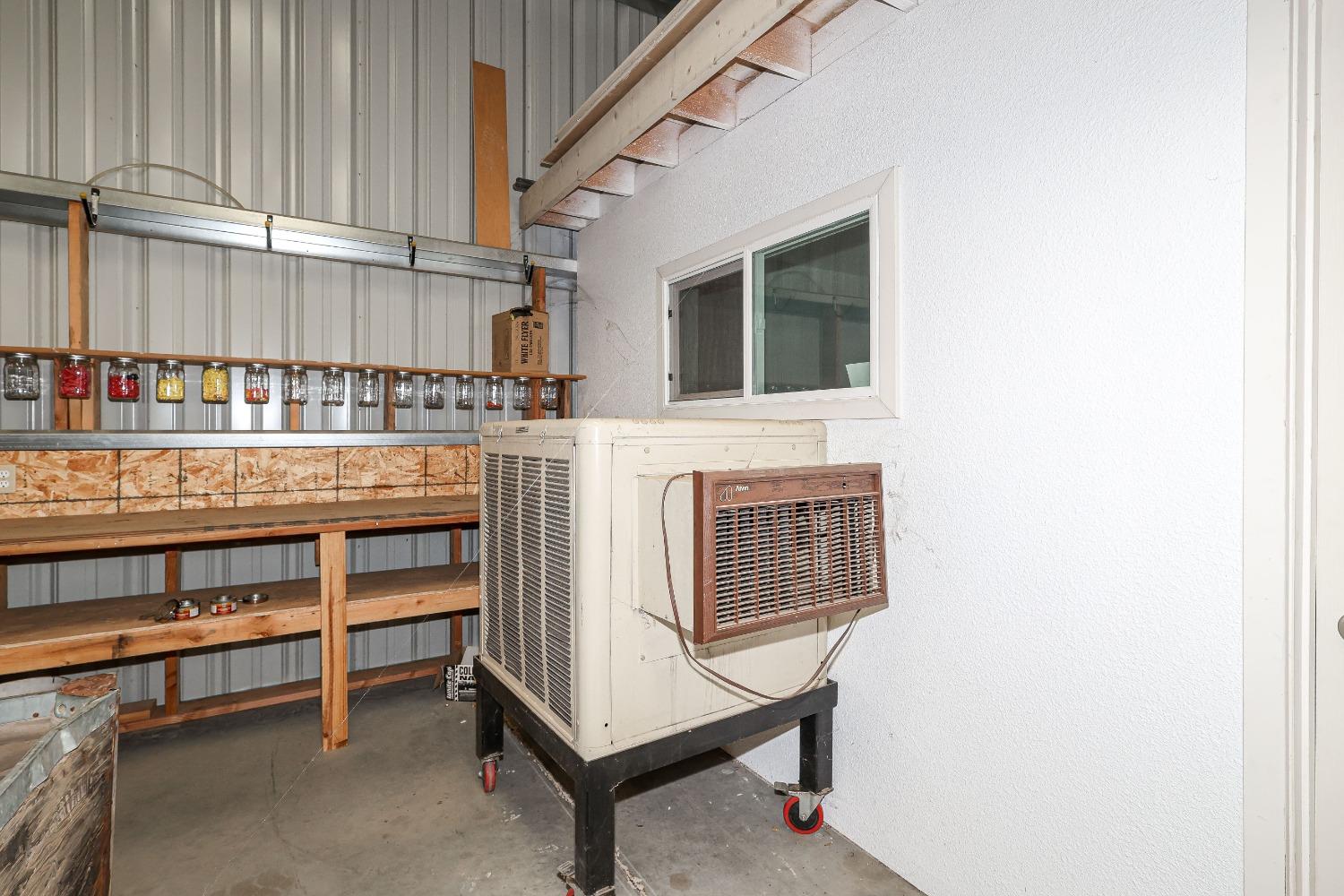 10391 Gillette Road Le Grand, CA 95333 - Photo 72 of 83 a view of a kitchen with furniture and window