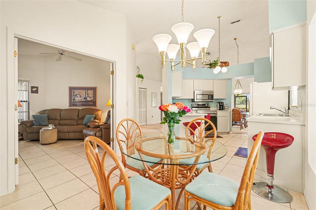 9130 Bassett Lane New Port Richey, FL 34655 - Photo 20 of 41 a view of a dining room with furniture