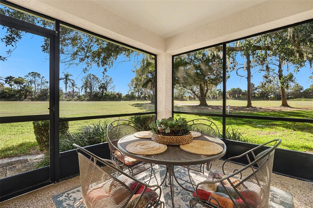 9130 Bassett Lane New Port Richey, FL 34655 - Photo 2 of 41 a view of a city from a dining room with furniture window and outside view