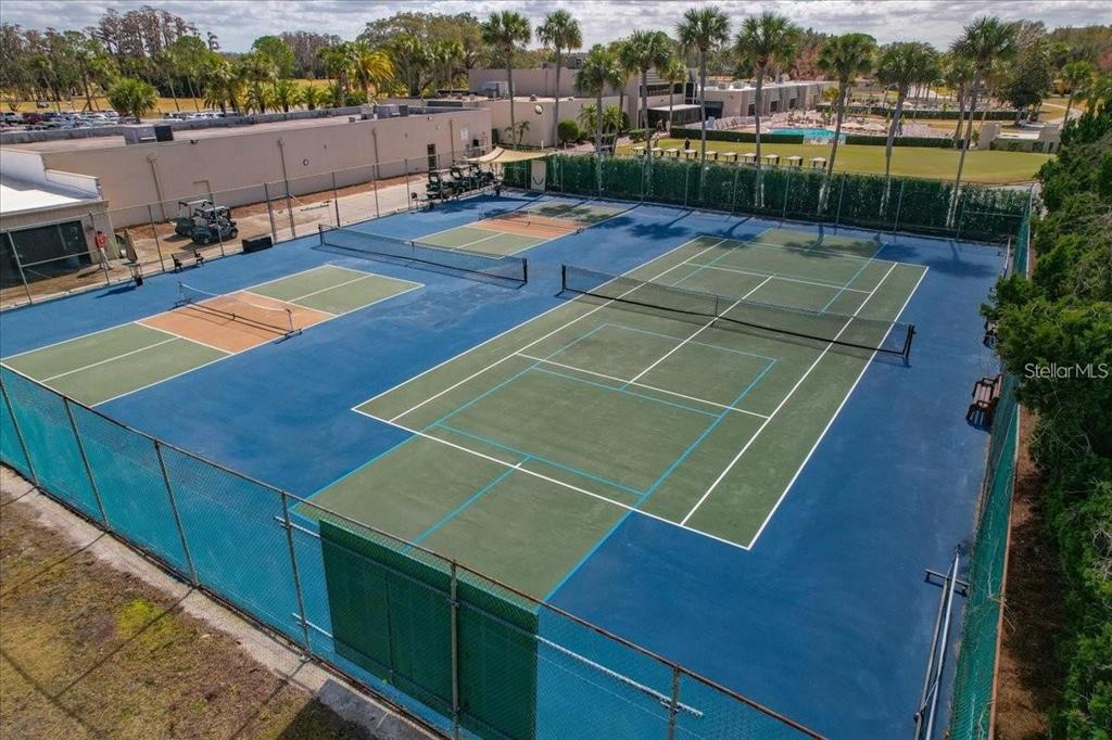 9130 Bassett Lane New Port Richey, FL 34655 - Photo 38 of 41 a view of a tennis court