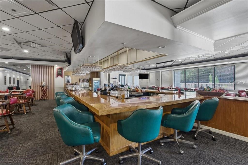 9130 Bassett Lane New Port Richey, FL 34655 - Photo 41 of 41 a view of a dining room with furniture