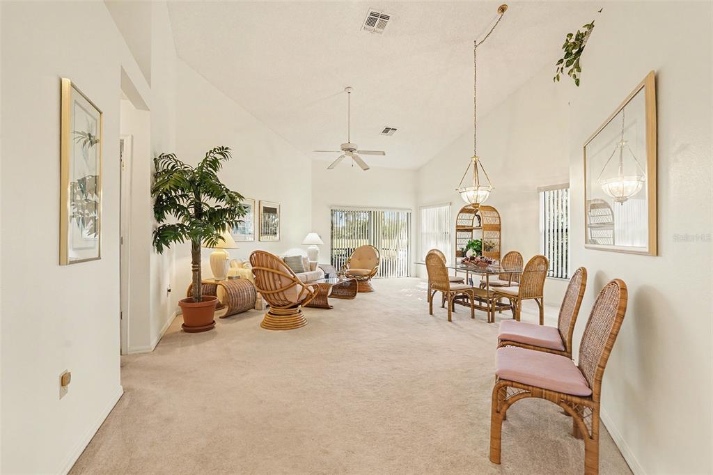 9130 Bassett Lane New Port Richey, FL 34655 - Photo 10 of 41 a living room with furniture and a large window