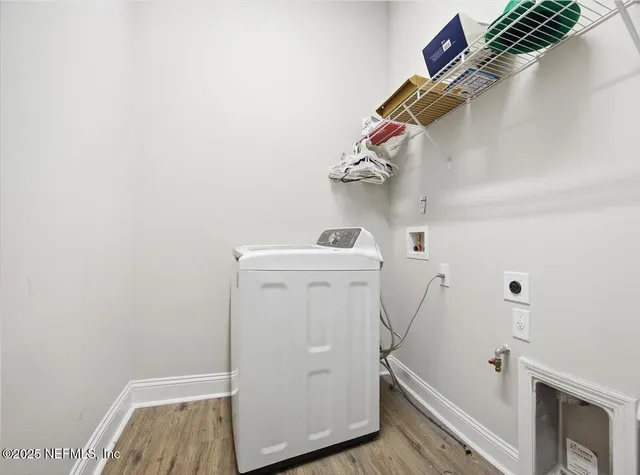 a utility room with a washer and dryer