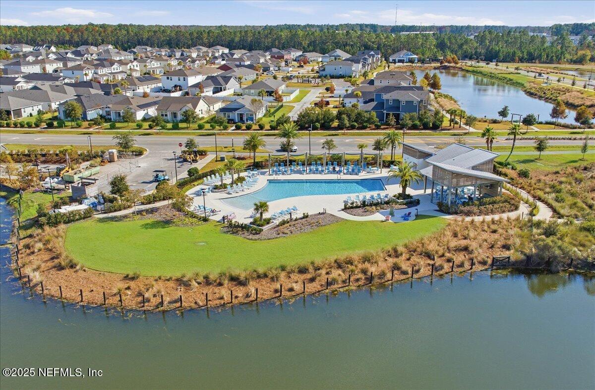 230 Julep Street Yulee, FL 32097 - Photo 20 of 24 an aerial view of residential houses with outdoor space swimming pool and ocean view