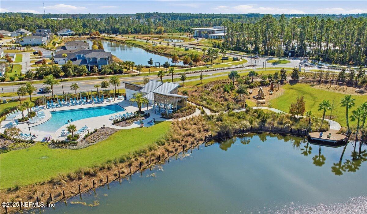 230 Julep Street Yulee, FL 32097 - Photo 21 of 24 an aerial view of a house with a garden and lake view
