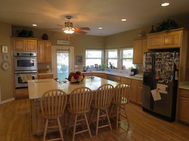 17410 Bowman Road Cottonwood, CA 96022 - Photo 13 of 24 a view of a dining room with furniture window and wooden floor