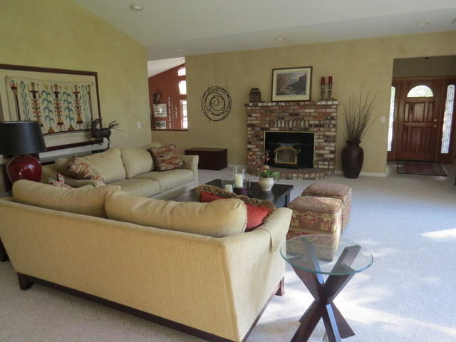 17410 Bowman Road Cottonwood, CA 96022 - Photo 14 of 24 a living room with furniture and a fireplace