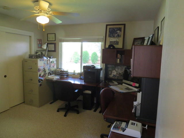 17410 Bowman Road Cottonwood, CA 96022 - Photo 6 of 24 a view of workspace with wooden floor windows