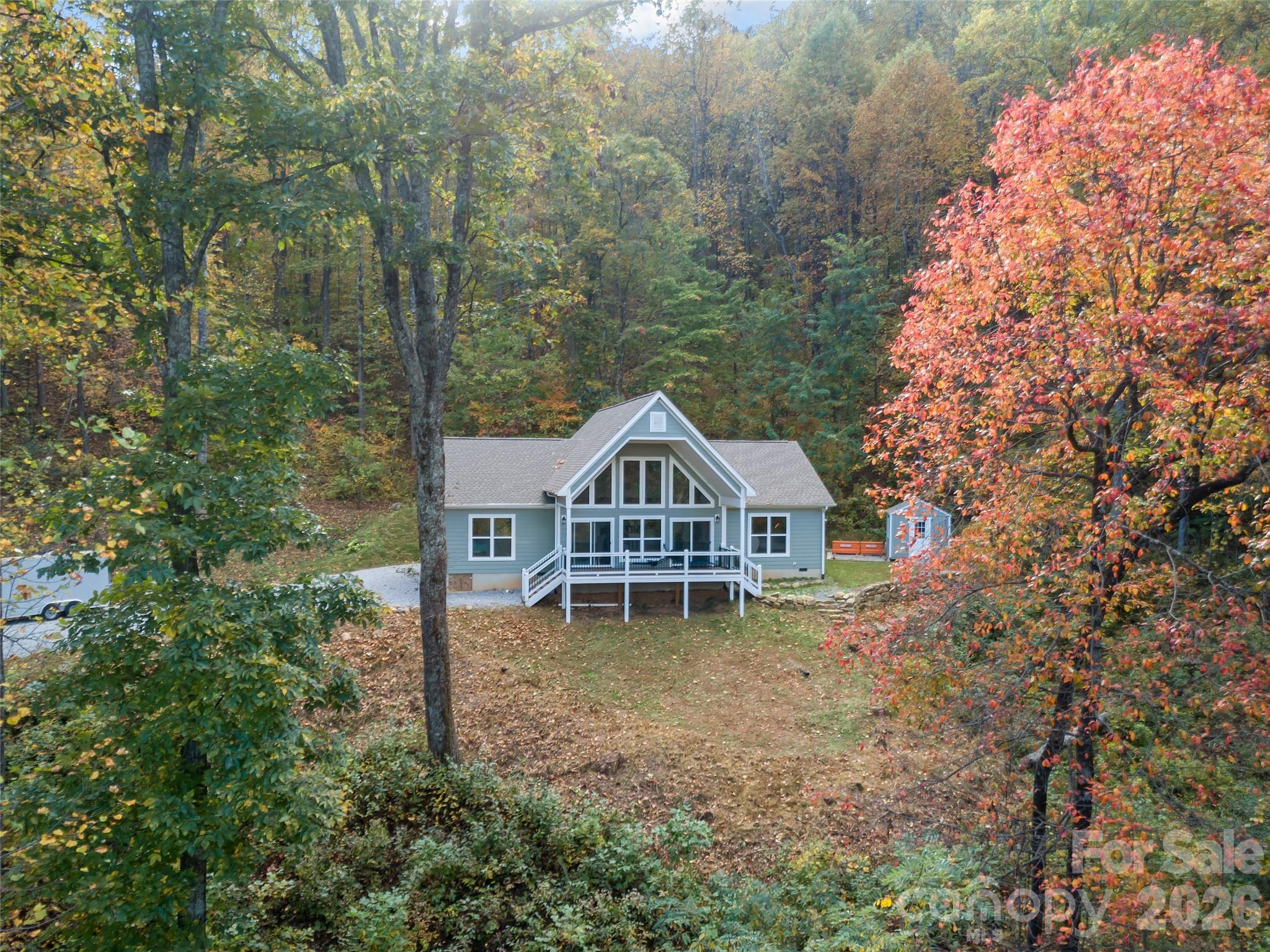 771 Sally Gap Road Old Fort, NC 28762 - Photo 34 of 44 front view of a house with a yard
