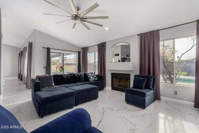 a bed room with a bed and a television