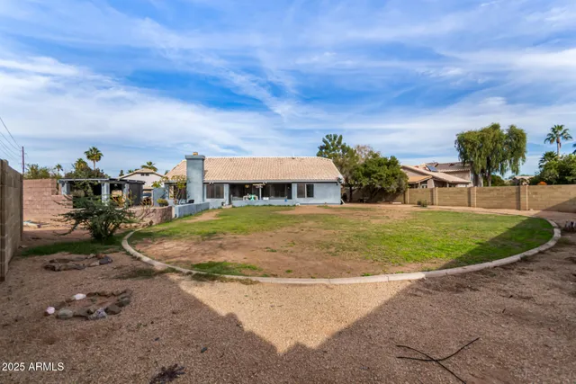 a view of swimming pool with seating space