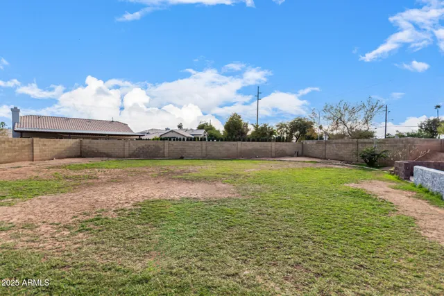a view of a house with swimming pool